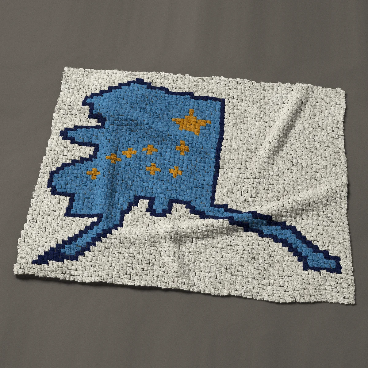 A baby blanket worked corner to corner, 48½ by 42 inches: Alaska state map with the Big Dipper and North Star, 65 by 56 blocks