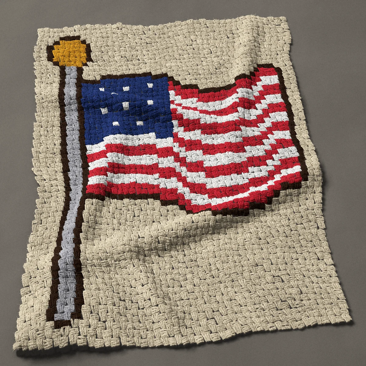 A lap blanket worked corner to corner, 34½ by 47 inches: American flag waving on a flagpole with a gold ball, 46 by 63 blocks