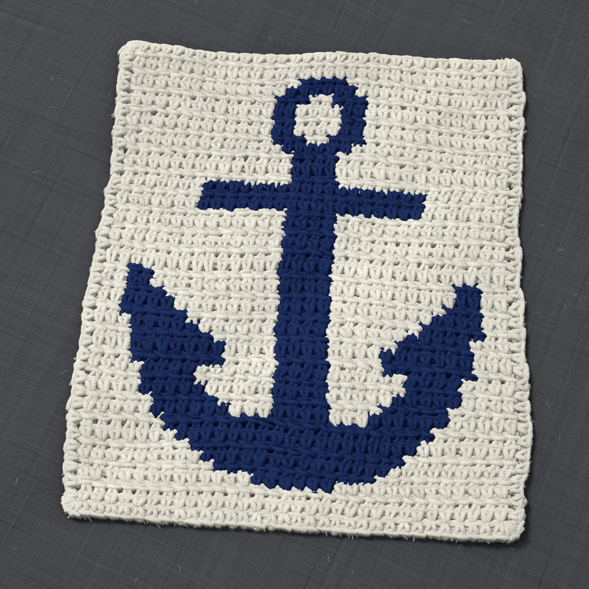 A panel in single crochet, 9.8 by 11.7 inches: an anchor in navy on a cream ground, 32 stitches by 44 rows
