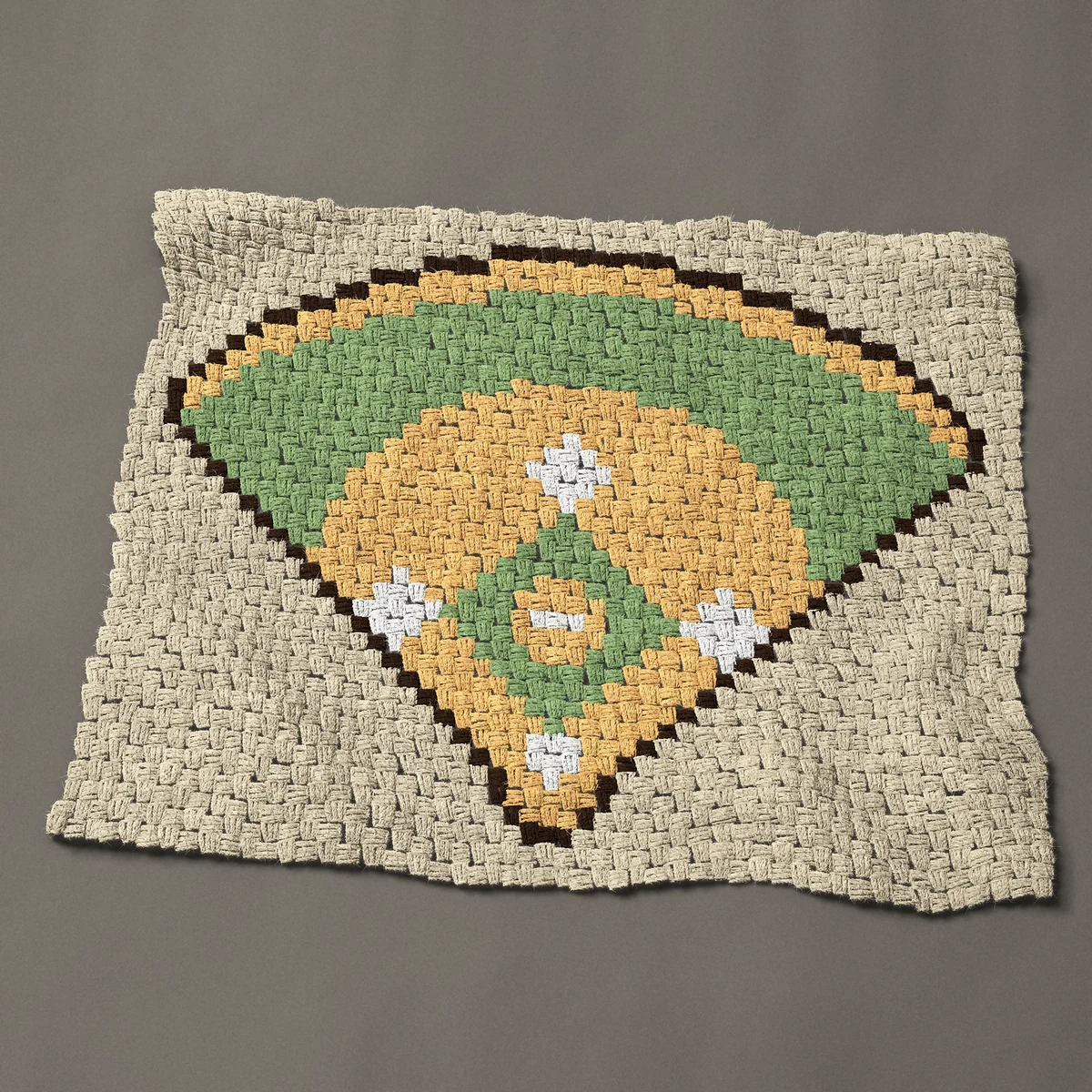 A baby blanket worked corner to corner, 38 by 30 inches: Baseball diamond from above with white bases, 51 by 40 blocks