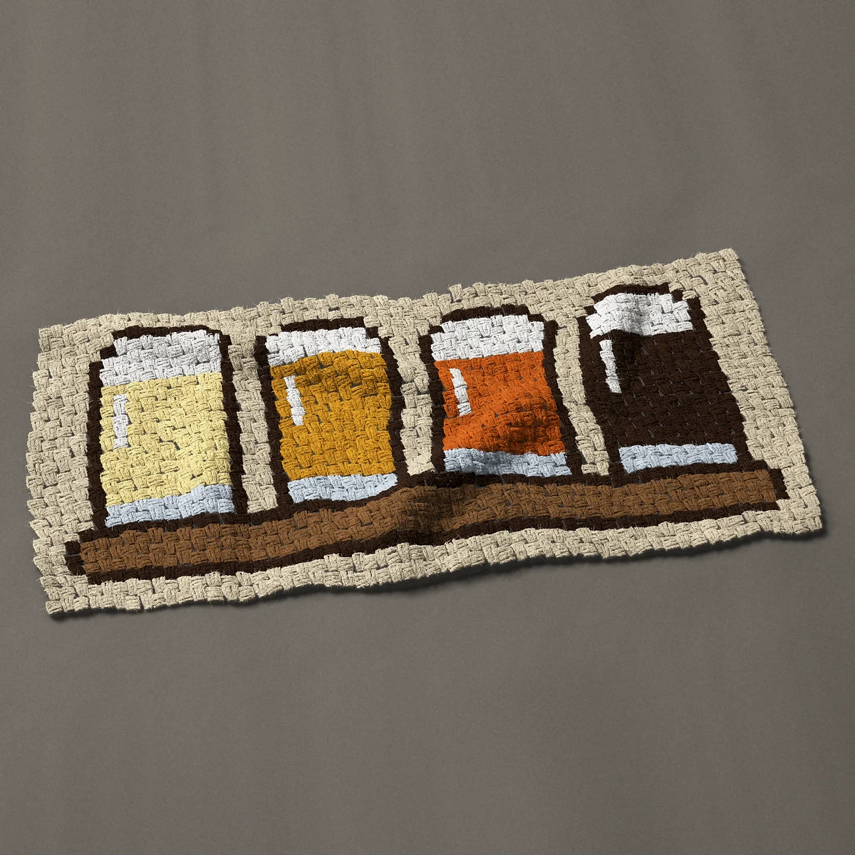 A panel worked corner to corner, 43½ by 20¼ inches: Beer flight: four glasses of beer from pale to dark, 58 by 27 blocks