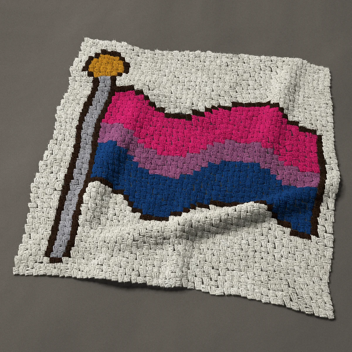 A baby blanket worked corner to corner, 36 by 37½ inches: Bisexual pride flag waving on a flagpole, 48 by 50 blocks