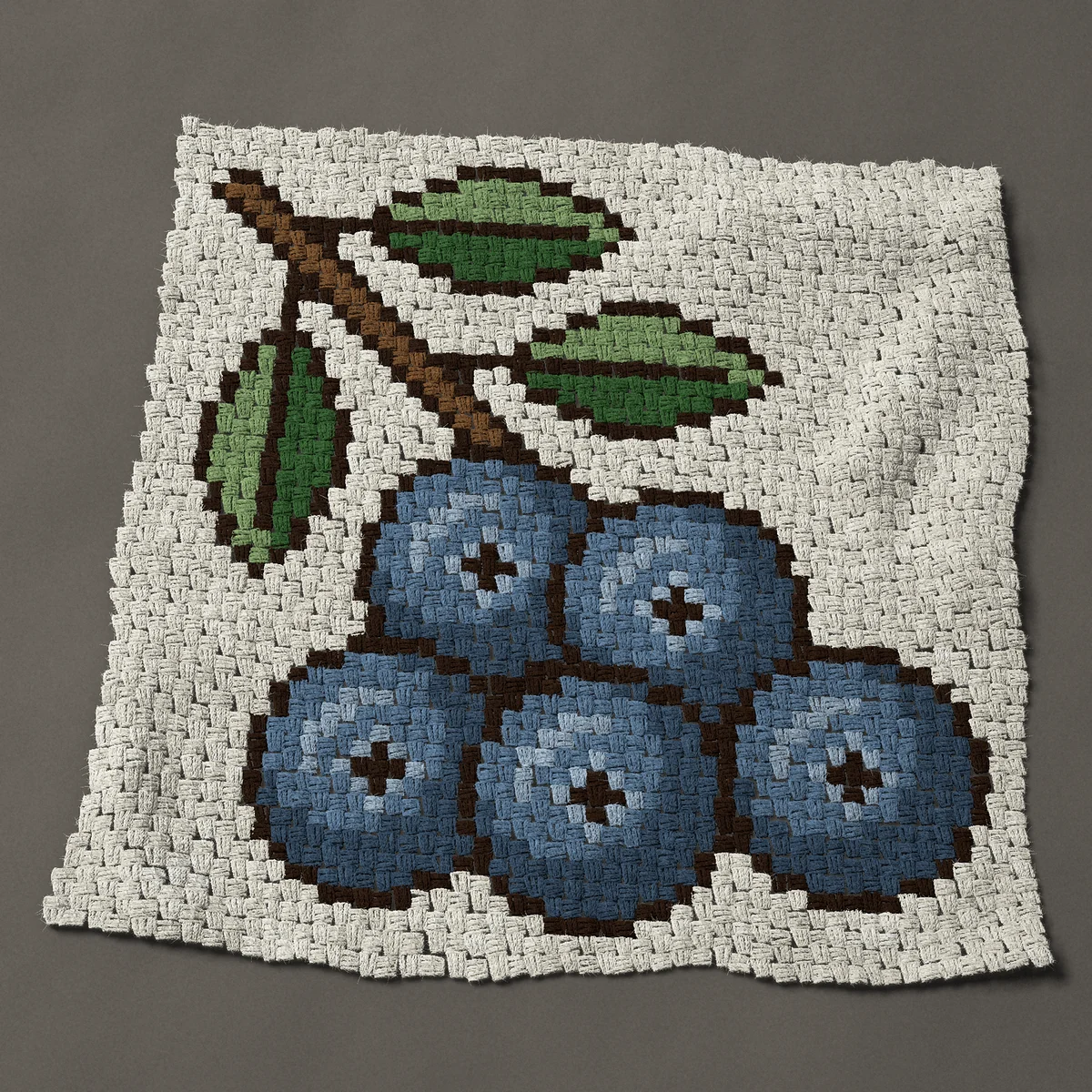 A baby blanket worked corner to corner, 38 by 38 inches: Blueberries on a sprig: five berries and three leaves, 51 by 51 blocks