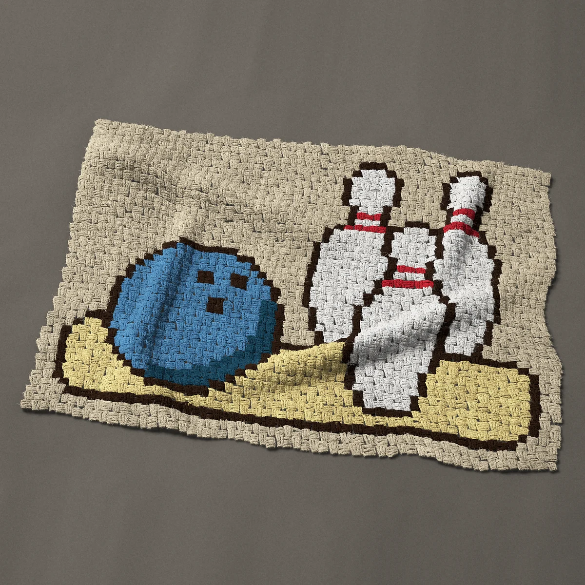 A baby blanket worked corner to corner, 43½ by 31½ inches: Bowling ball and three bowling pins on a wooden lane, 58 by 42 blocks