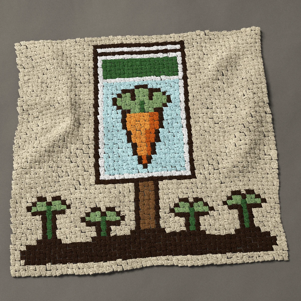 A baby blanket worked corner to corner, 41 by 40½ inches: Carrot seed packet on a stick in a row of seedlings, 55 by 54 blocks