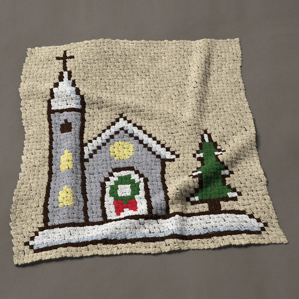 A baby blanket worked corner to corner, 41 by 44 inches: Christmas chapel in the snow with a wreath on its door, 55 by 59 blocks