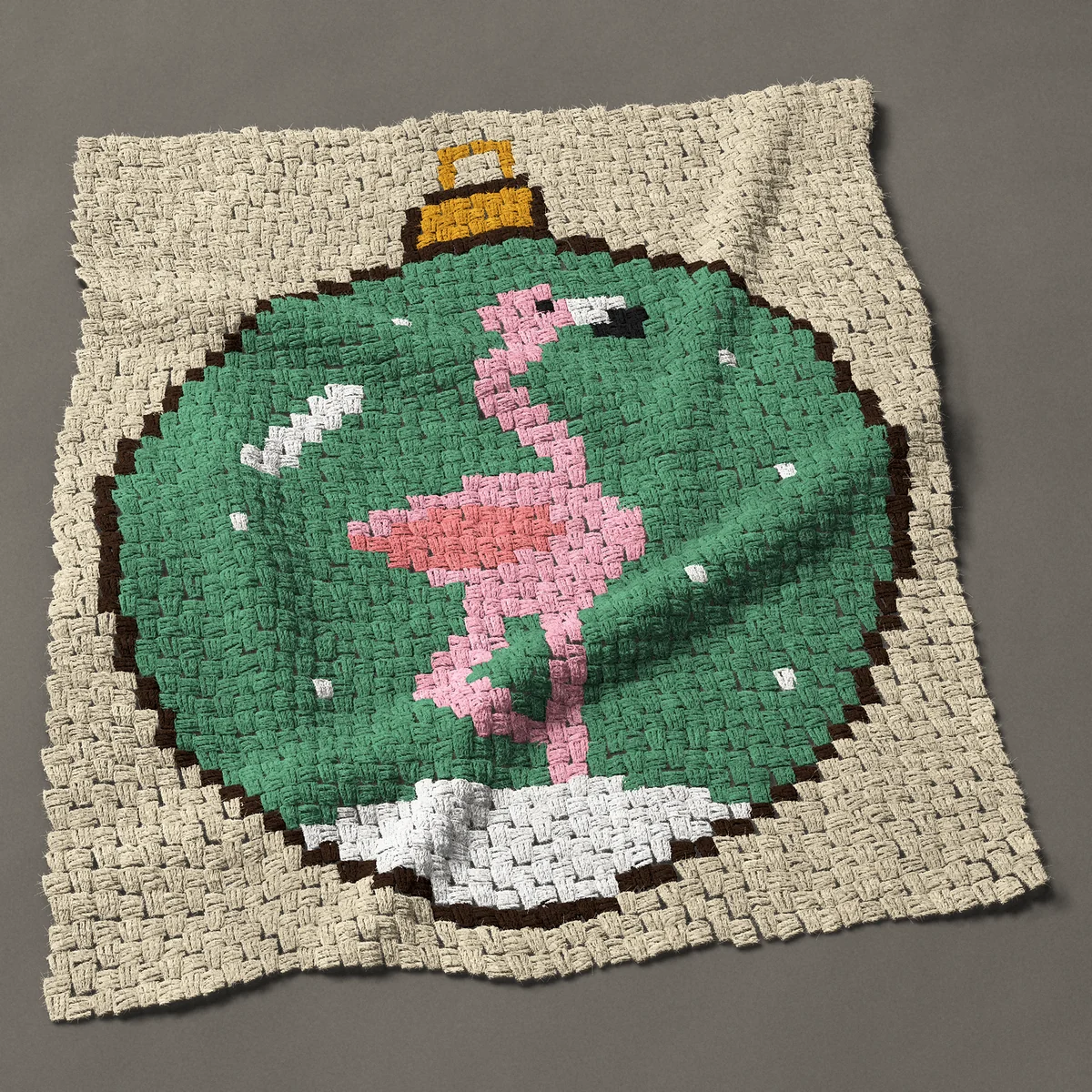 A baby blanket worked corner to corner, 35¼ by 40½ inches: Christmas flamingo in a green bauble, 47 by 54 blocks