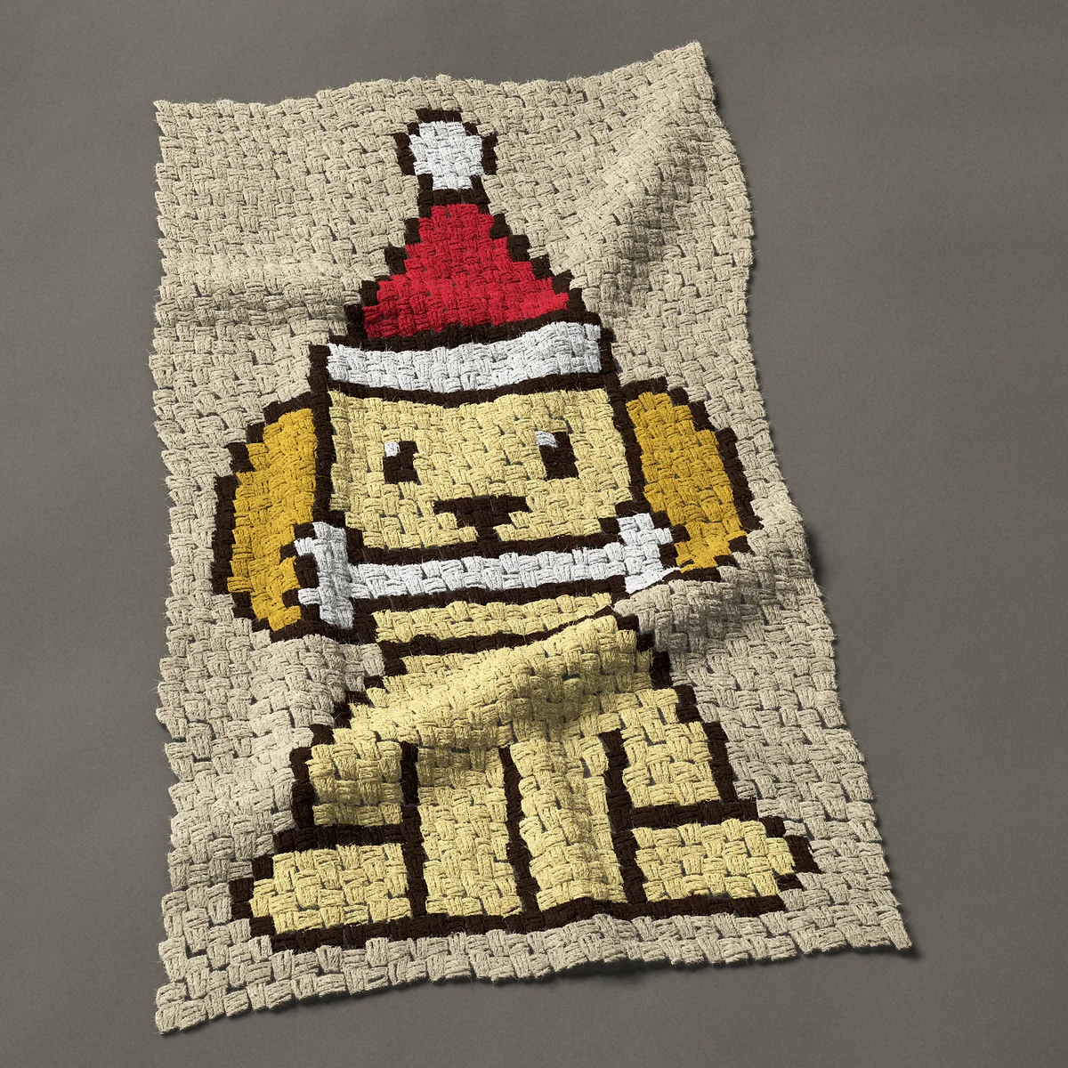 A baby blanket worked corner to corner, 26¼ by 45½ inches: Christmas dog in a Santa hat with a bone, a cute puppy, 35 by 61 blocks