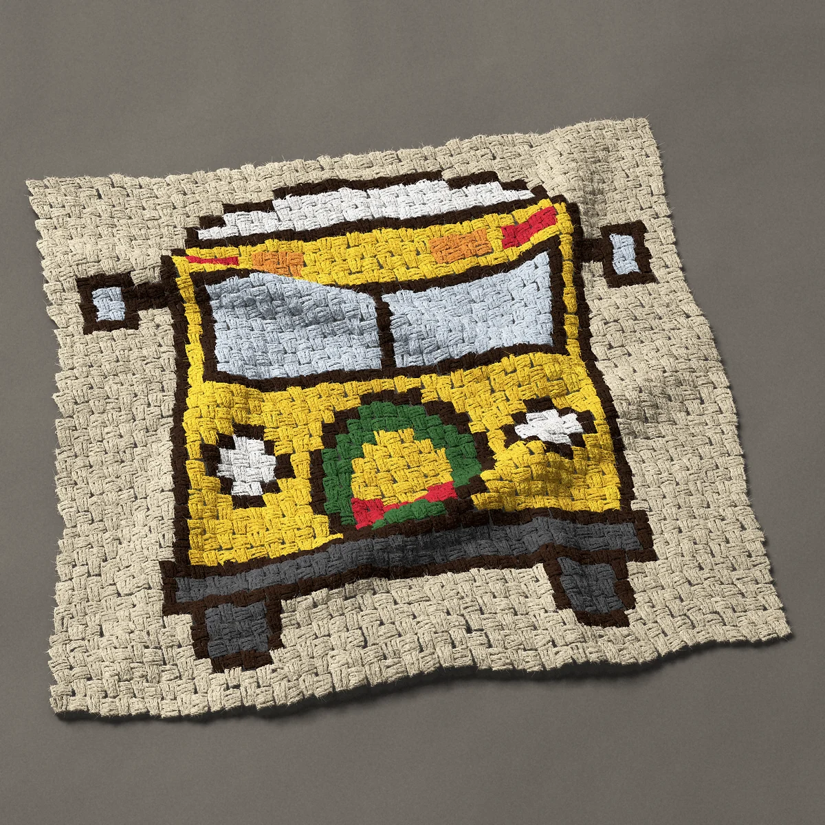 A panel worked corner to corner, 35¼ by 33 inches: Christmas school bus with a wreath and snow on the roof, 47 by 44 blocks