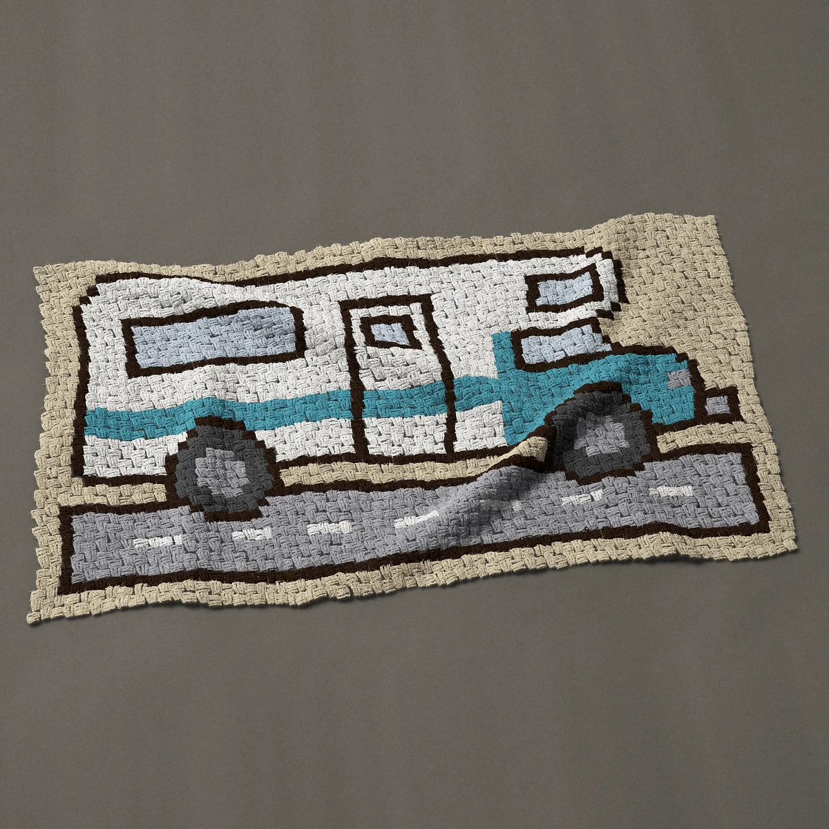 A baby blanket worked corner to corner, 51 by 29¼ inches: Class C motorhome RV on the road, white and turquoise, 68 by 39 blocks