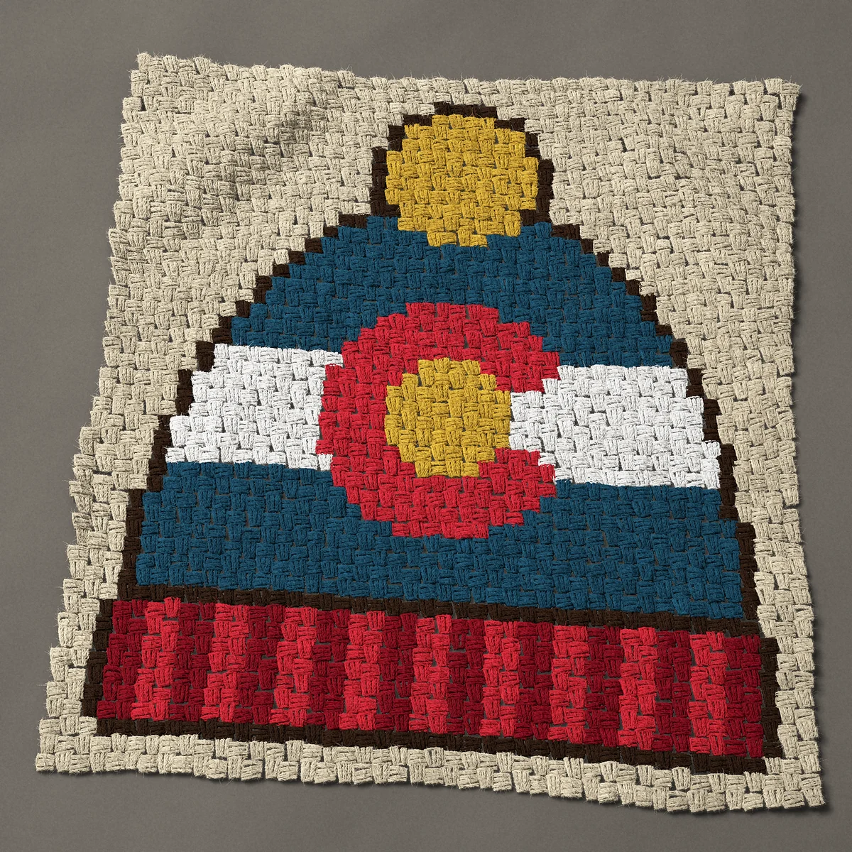 A panel worked corner to corner, 33 by 36 inches: Colorado flag beanie: a winter hat with a pom-pom, 44 by 48 blocks