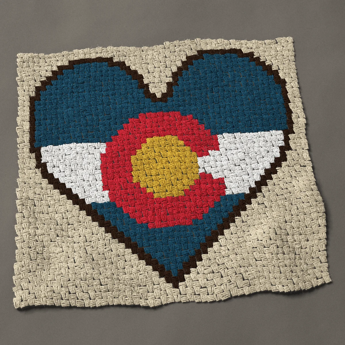 A baby blanket worked corner to corner, 36¾ by 35¼ inches: Colorado flag heart: the state flag in a heart, 49 by 47 blocks