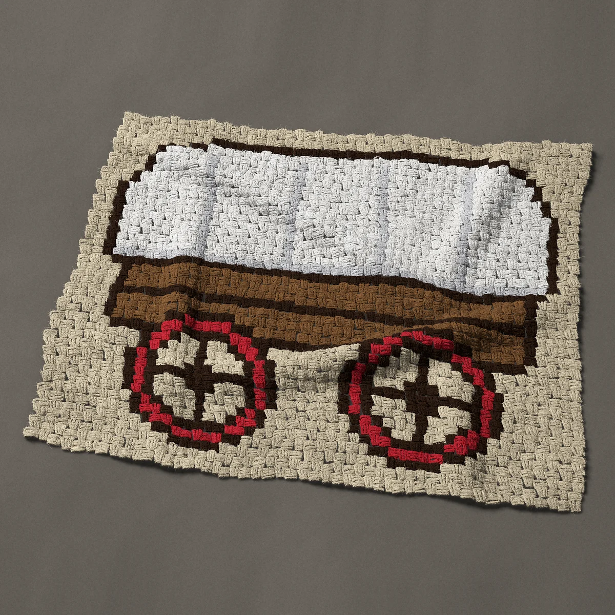 A baby blanket worked corner to corner, 37½ by 32¼ inches: Pioneer covered wagon with white canvas and red wheels, 50 by 43 blocks