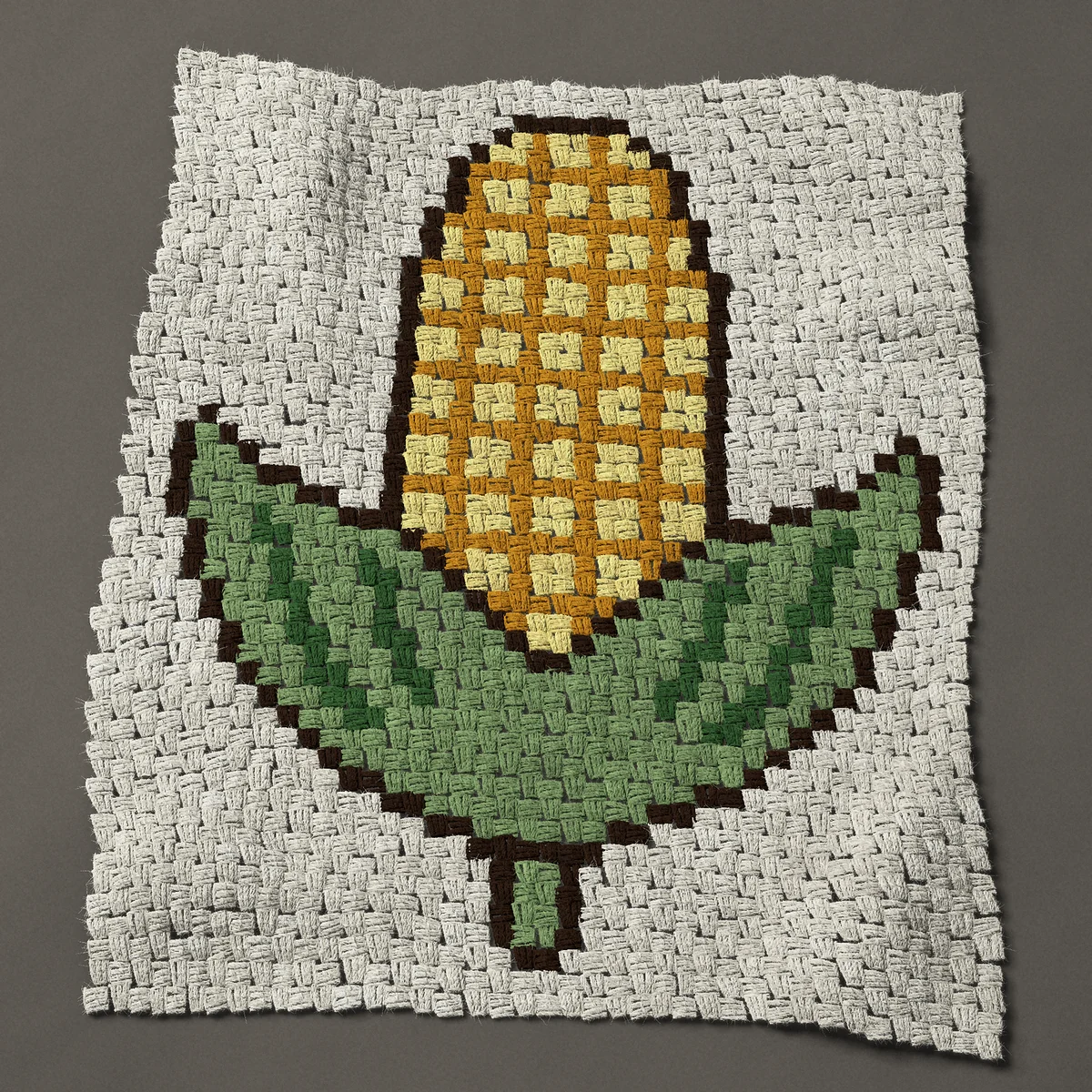 A baby blanket worked corner to corner, 30 by 36¾ inches: Ear of corn with the husk peeled back, 40 by 49 blocks