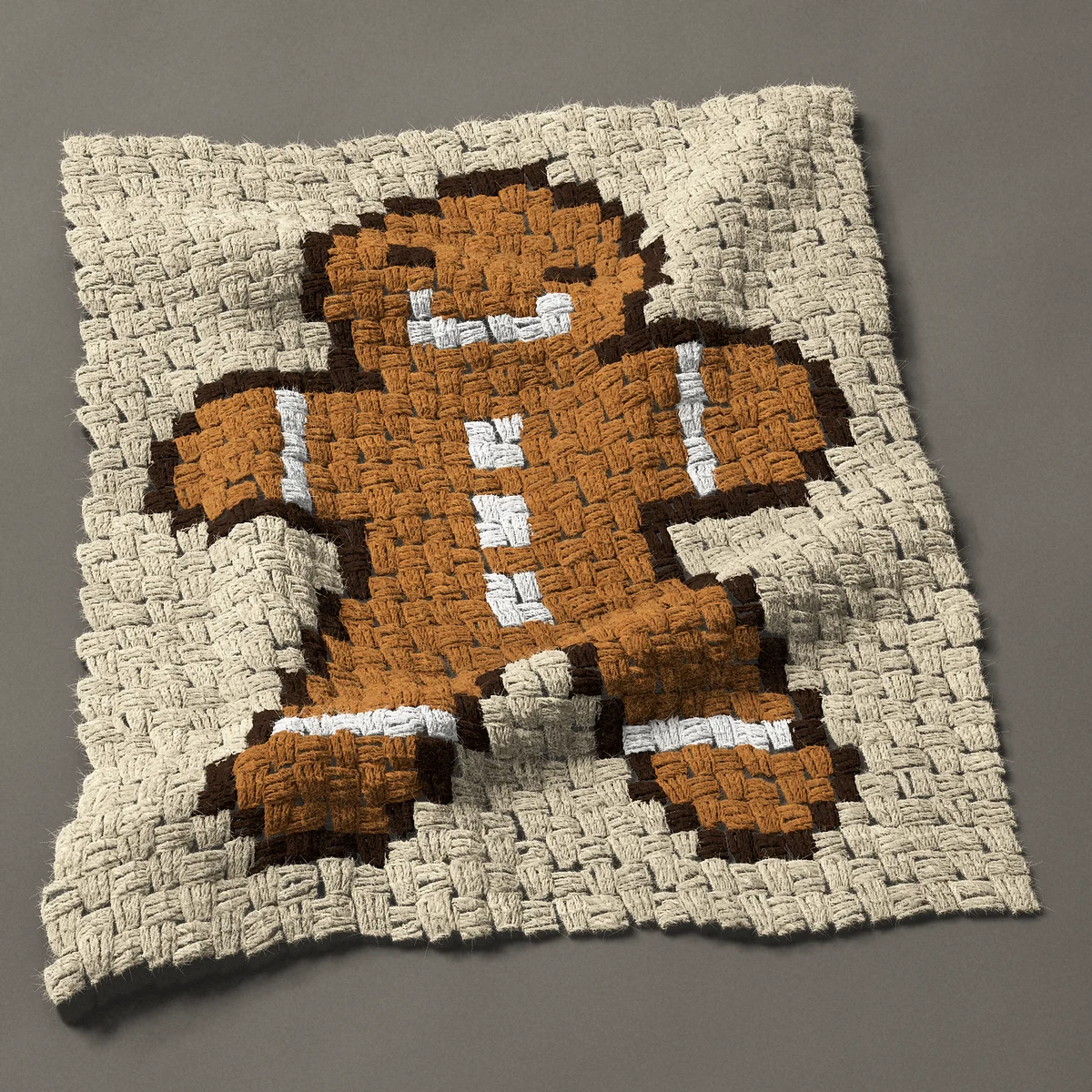 A panel worked corner to corner, 22½ by 27 inches: Gingerbread man with three icing buttons, 30 by 36 blocks