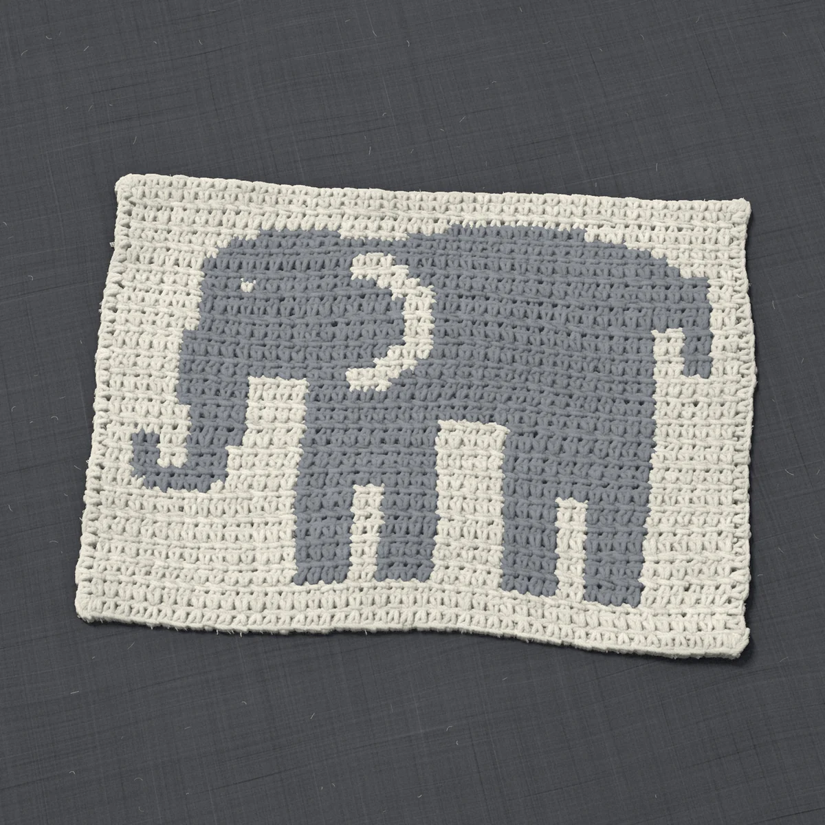 A panel in single crochet, 13.8 by 9.9 inches: an elephant in gray on a cream ground, 45 stitches by 37 rows