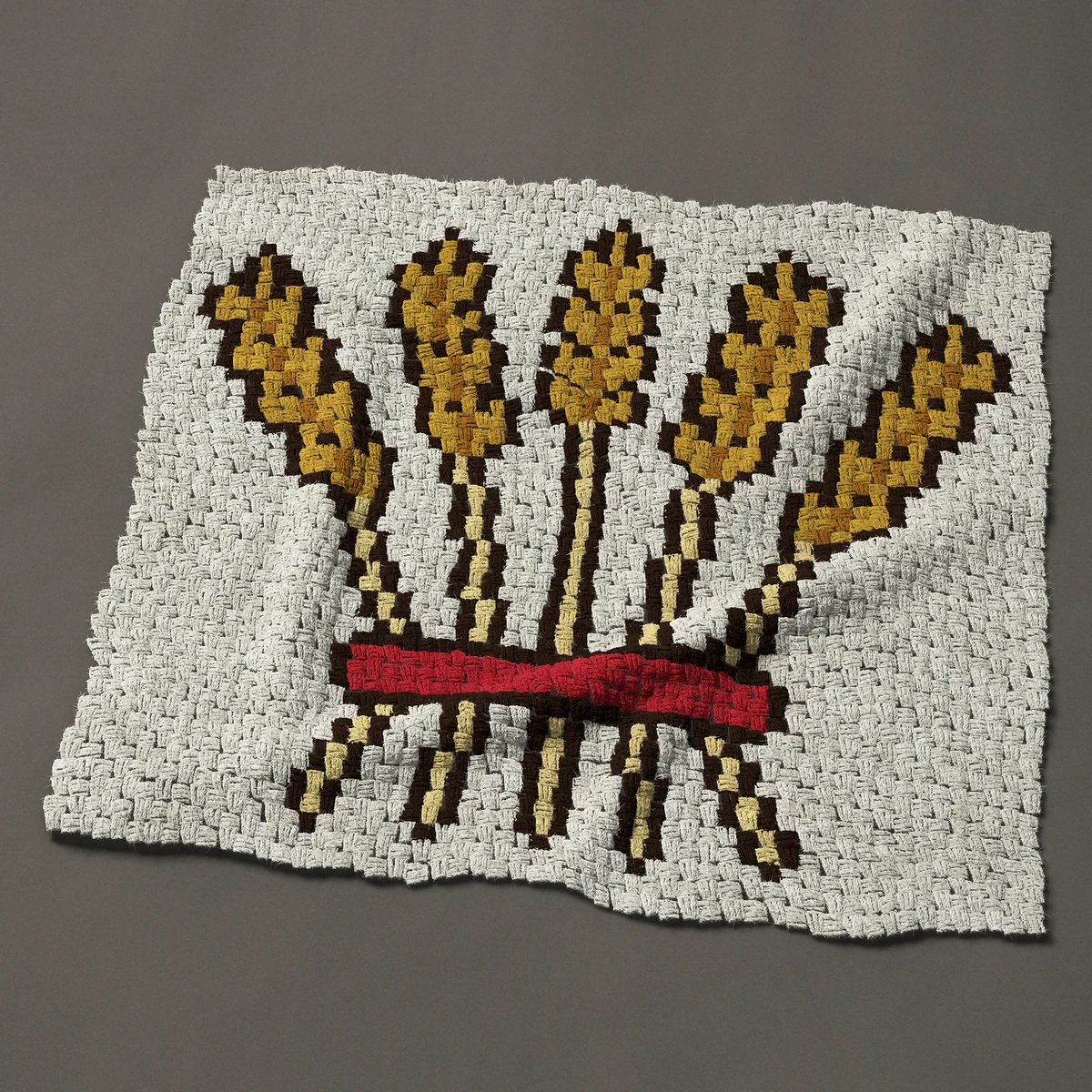 A baby blanket worked corner to corner, 41 by 38 inches: Five ears of wheat tied with a red band, 55 by 51 blocks