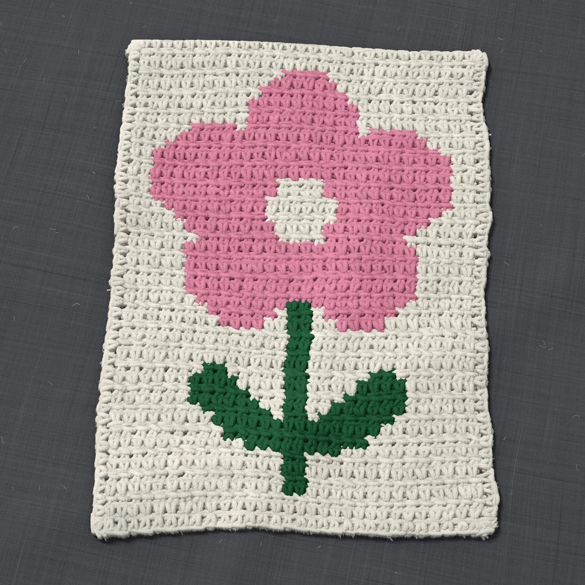 A panel in single crochet, 9.2 by 12.8 inches: a flower in pink and dark green on a cream ground, 30 stitches by 48 rows