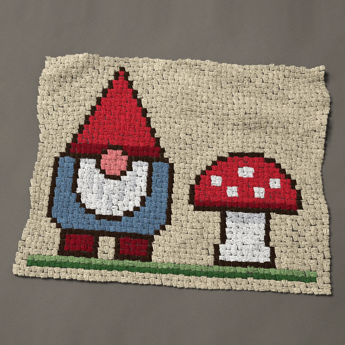 A baby blanket worked corner to corner, 41 by 33¾ inches: Garden gnome beside a red spotted toadstool, 55 by 45 blocks
