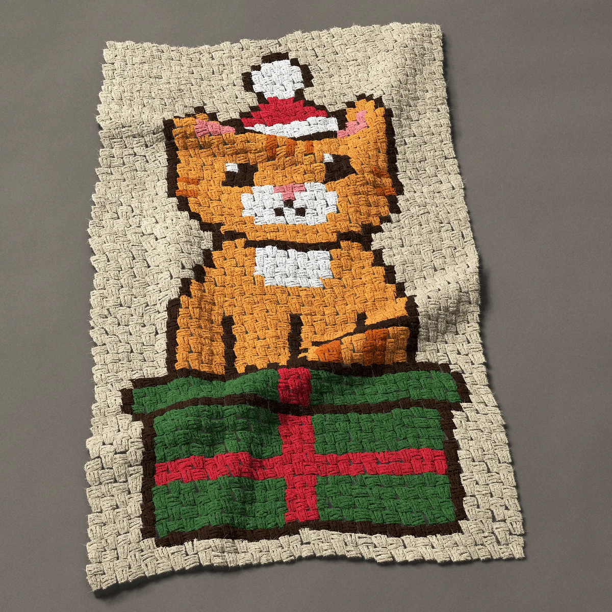 A baby blanket worked corner to corner, 26¼ by 45½ inches: Christmas cat in a Santa hat sitting on a present, 35 by 61 blocks