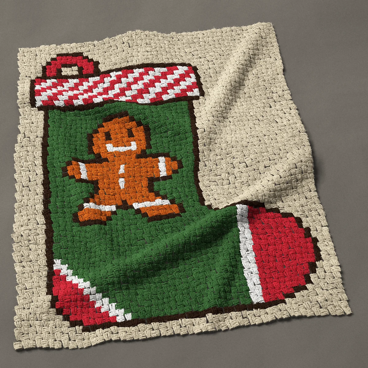 A lap blanket worked corner to corner, 37½ by 48 inches: Gingerbread man on a green Christmas stocking, 50 by 64 blocks