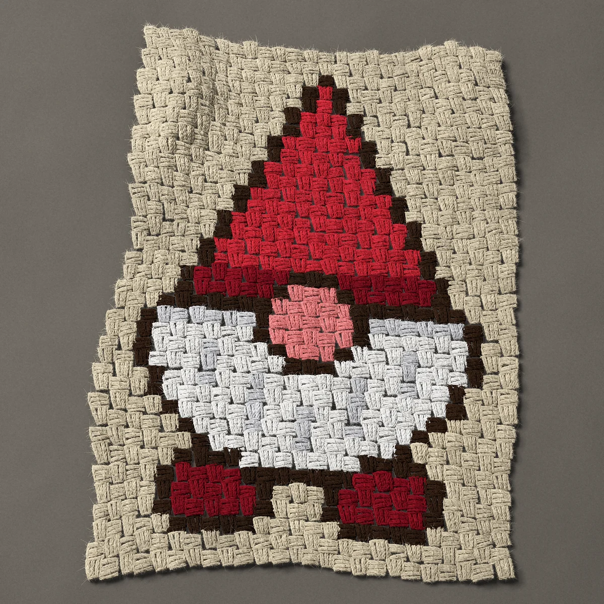 A panel worked corner to corner, 18¾ by 27 inches: Gnome with a tall red hat, pink nose and white beard, 25 by 36 blocks