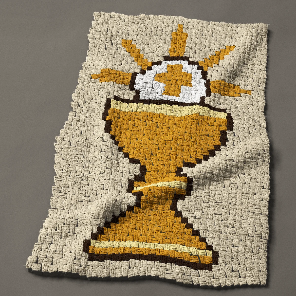 A baby blanket worked corner to corner, 26¼ by 42 inches: Gold communion chalice and host with rays, 35 by 56 blocks