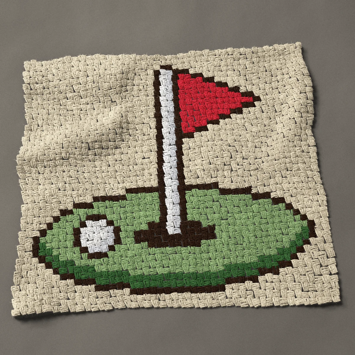 A panel worked corner to corner, 34½ by 32¼ inches: Golf flag in the hole with a ball, 46 by 43 blocks