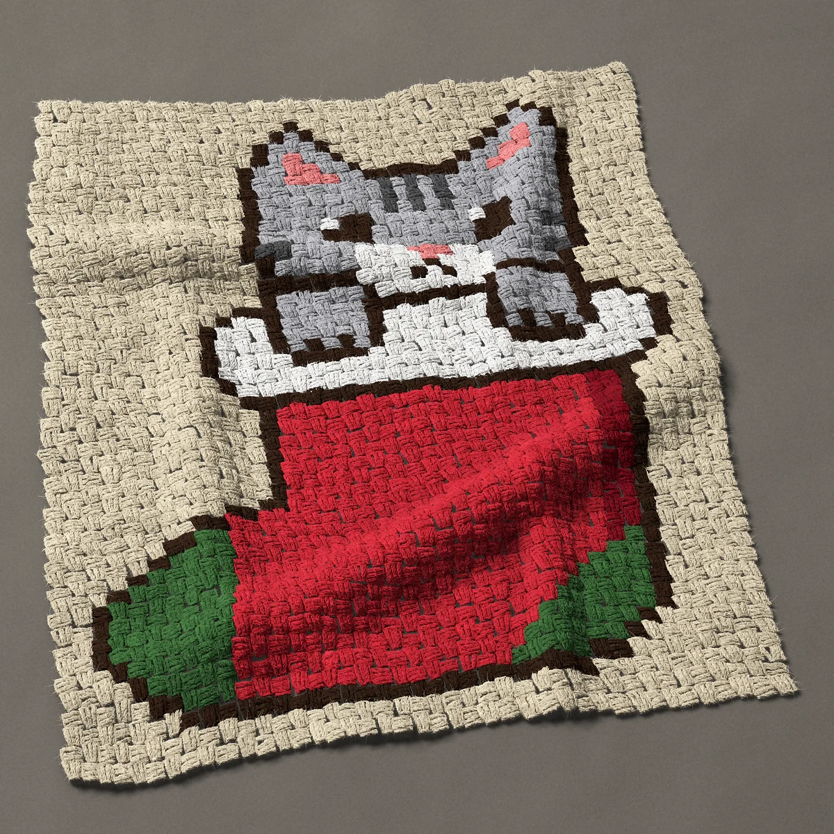 A baby blanket worked corner to corner, 30¾ by 38 inches: Kitten in a Christmas stocking, a gray tabby cat, 41 by 51 blocks