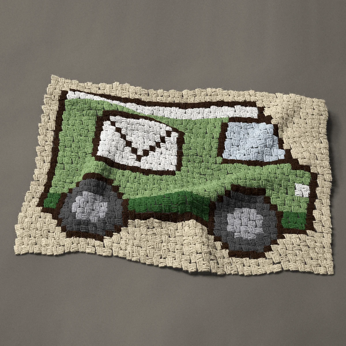 A panel worked corner to corner, 33¾ by 24 inches: Green mail truck with an envelope on its side, 45 by 32 blocks