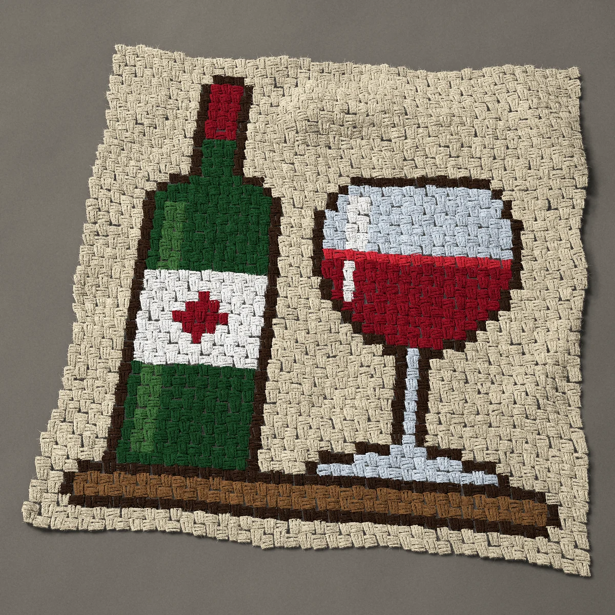 A panel worked corner to corner, 33¾ by 35¼ inches: Wine bottle and a glass of red wine, 45 by 47 blocks