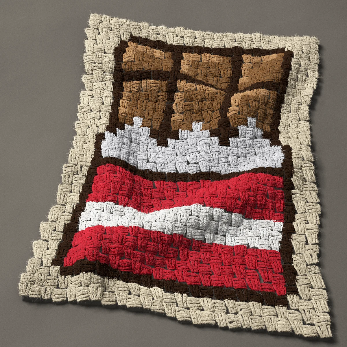 A panel worked corner to corner, 18¾ by 25½ inches: Half unwrapped chocolate candy bar in a red wrapper, 25 by 34 blocks