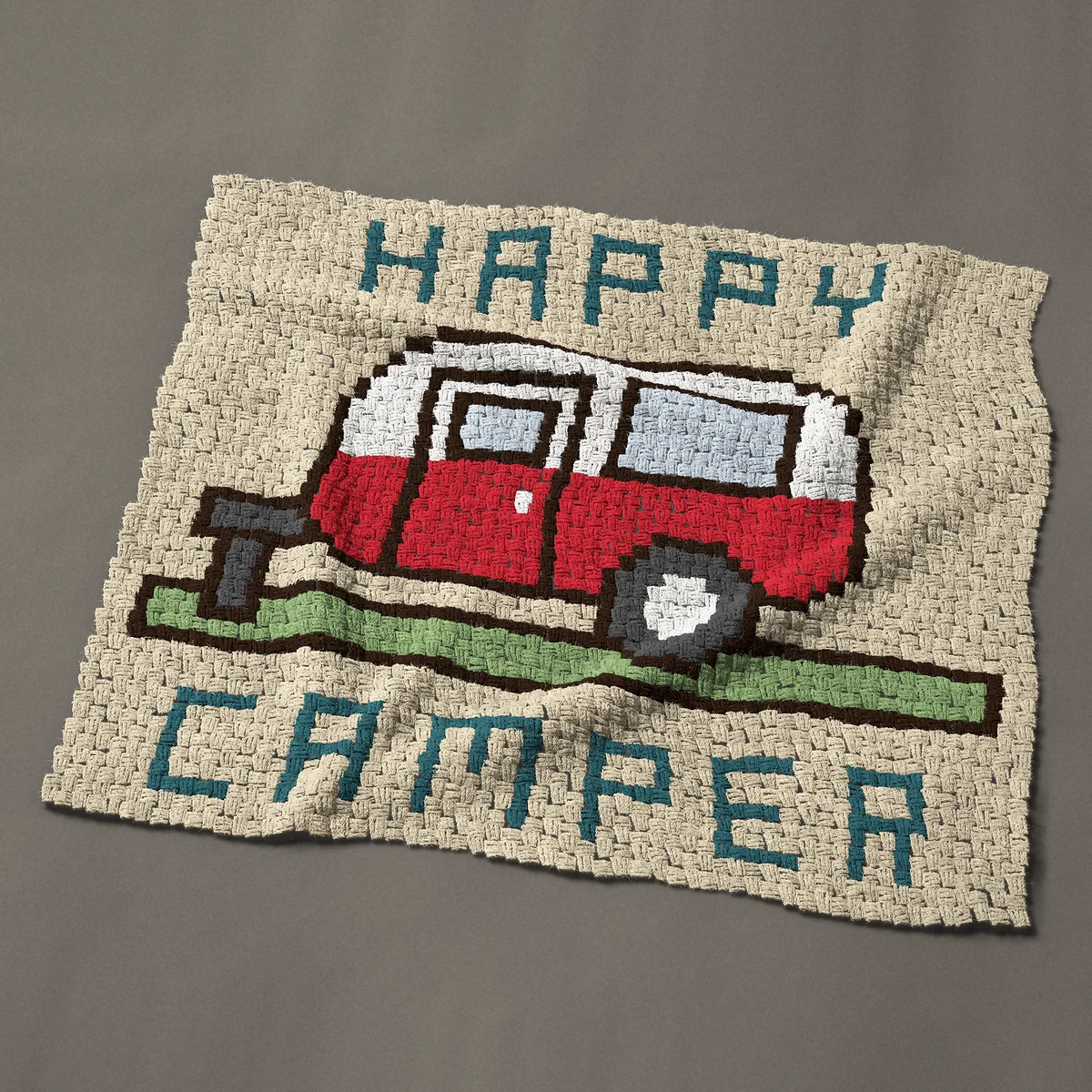 A baby blanket worked corner to corner, 44 by 39 inches: Happy Camper with a red and white camper trailer, 59 by 52 blocks