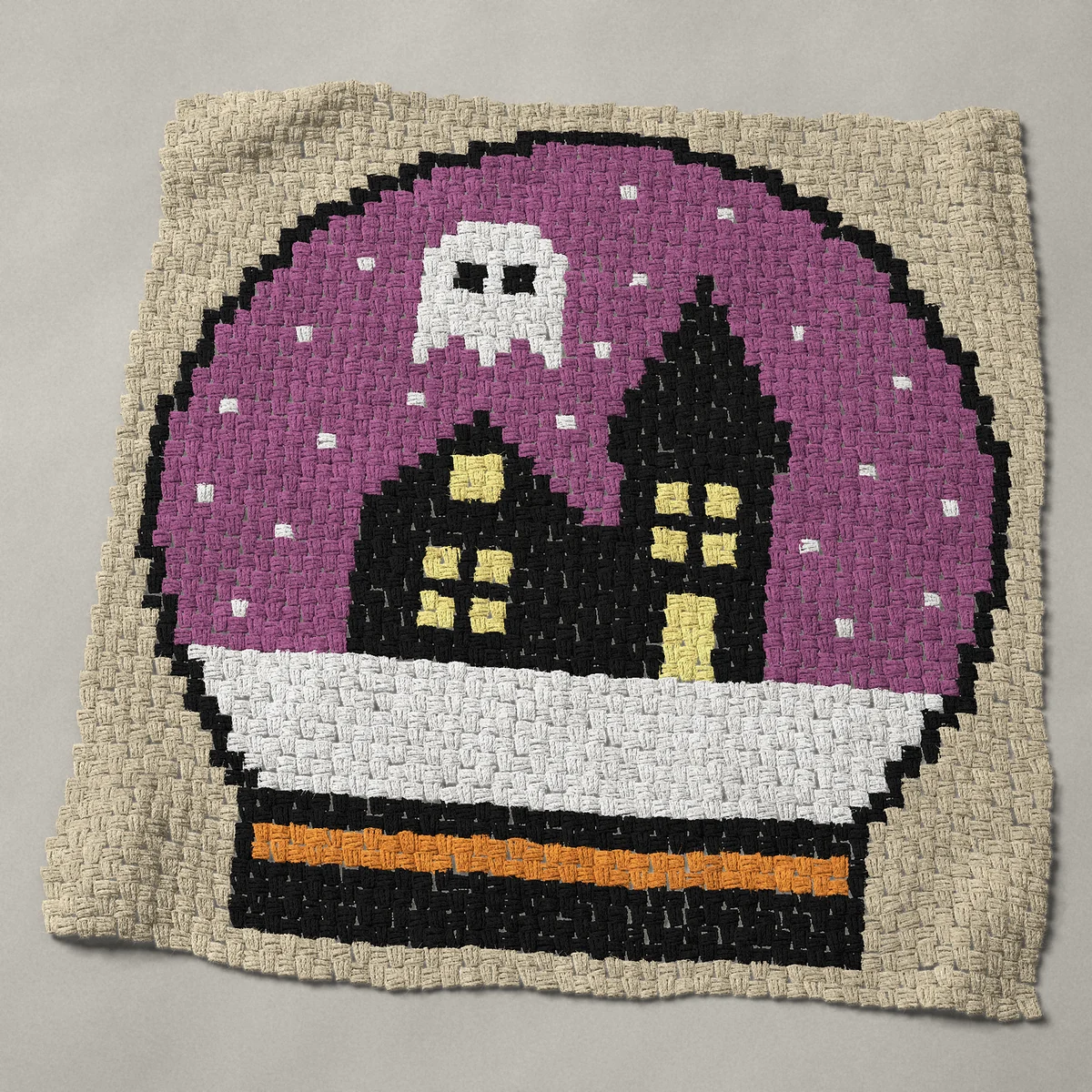 A baby blanket worked corner to corner, 41 by 42 inches: Halloween snow globe with a haunted house and a ghost, 55 by 56 blocks