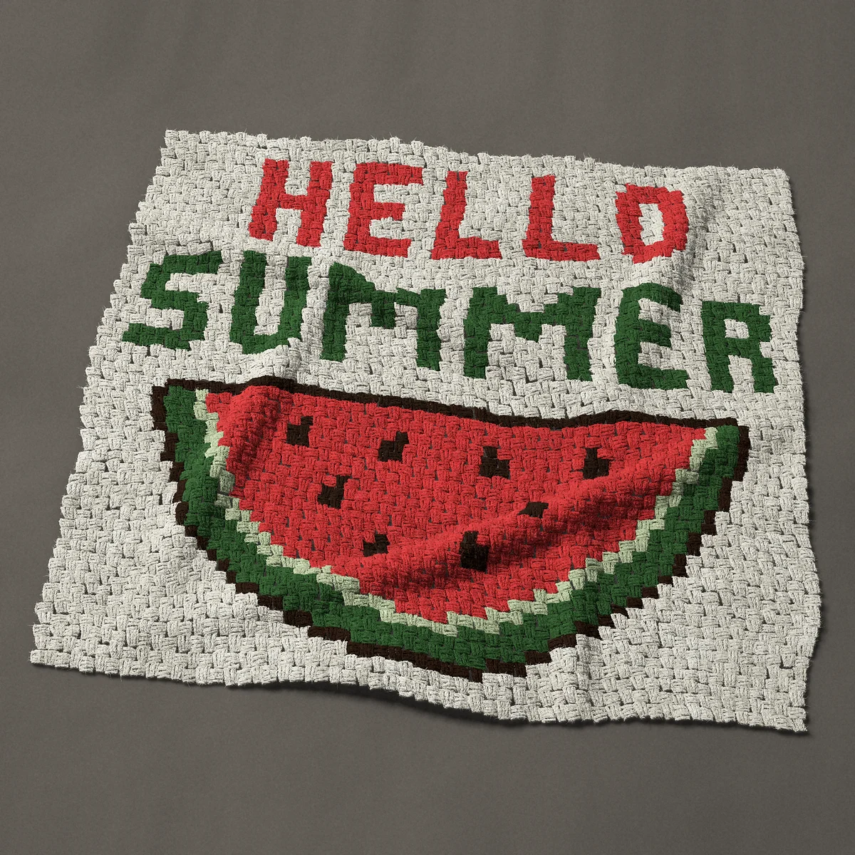 A baby blanket worked corner to corner, 43½ by 41 inches: Hello summer lettering over a slice of watermelon, 58 by 55 blocks