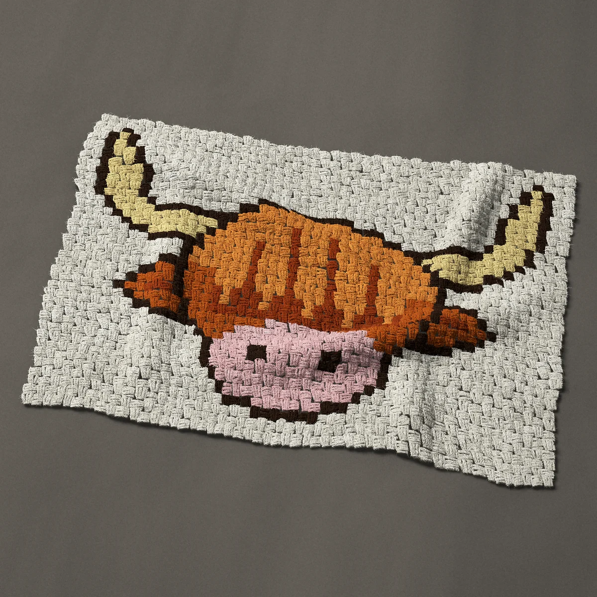 A baby blanket worked corner to corner, 38 by 27¾ inches: Highland cow face with a long shaggy fringe and horns, 51 by 37 blocks