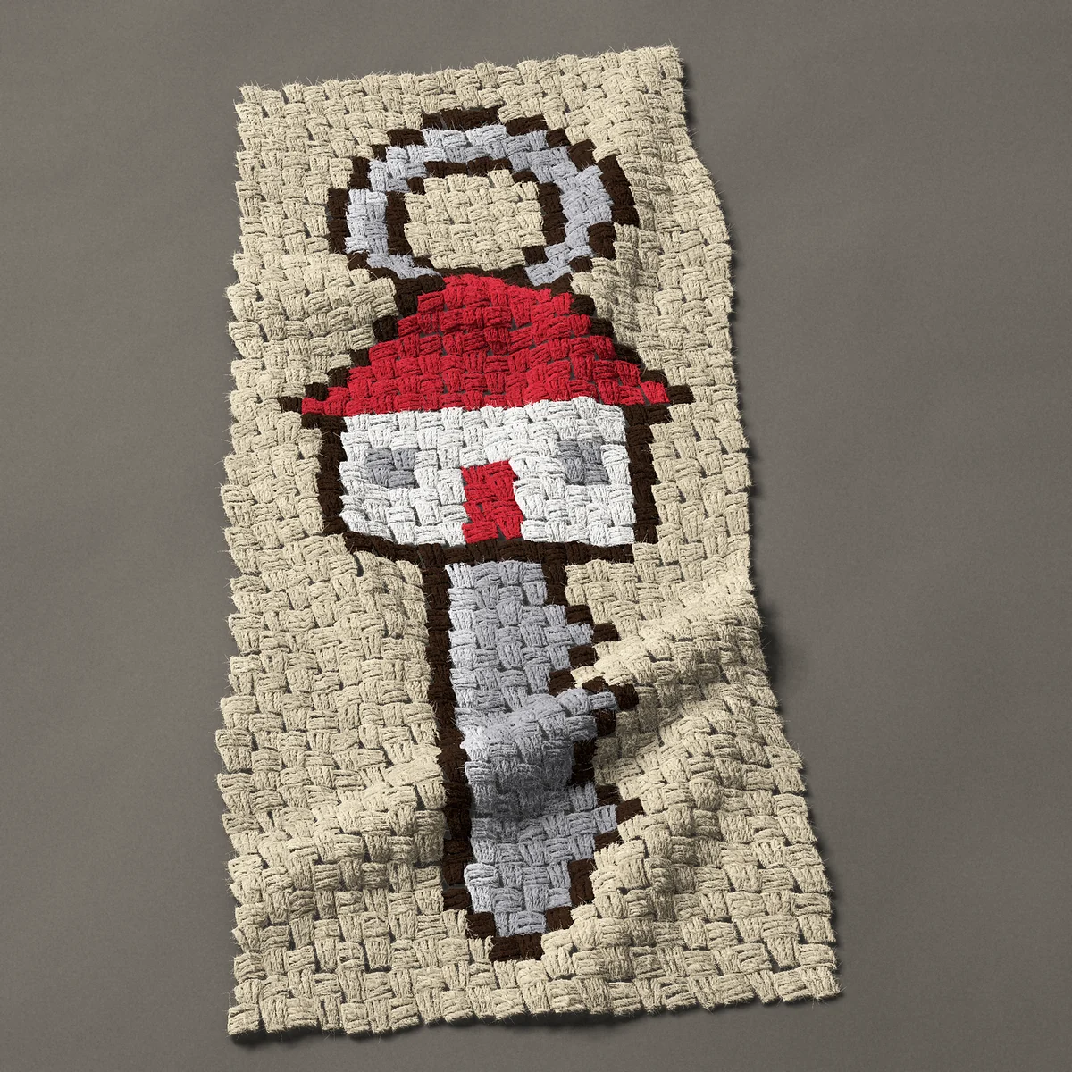 A panel worked corner to corner, 16½ by 37½ inches: House key with a little white house on a key ring, 22 by 50 blocks