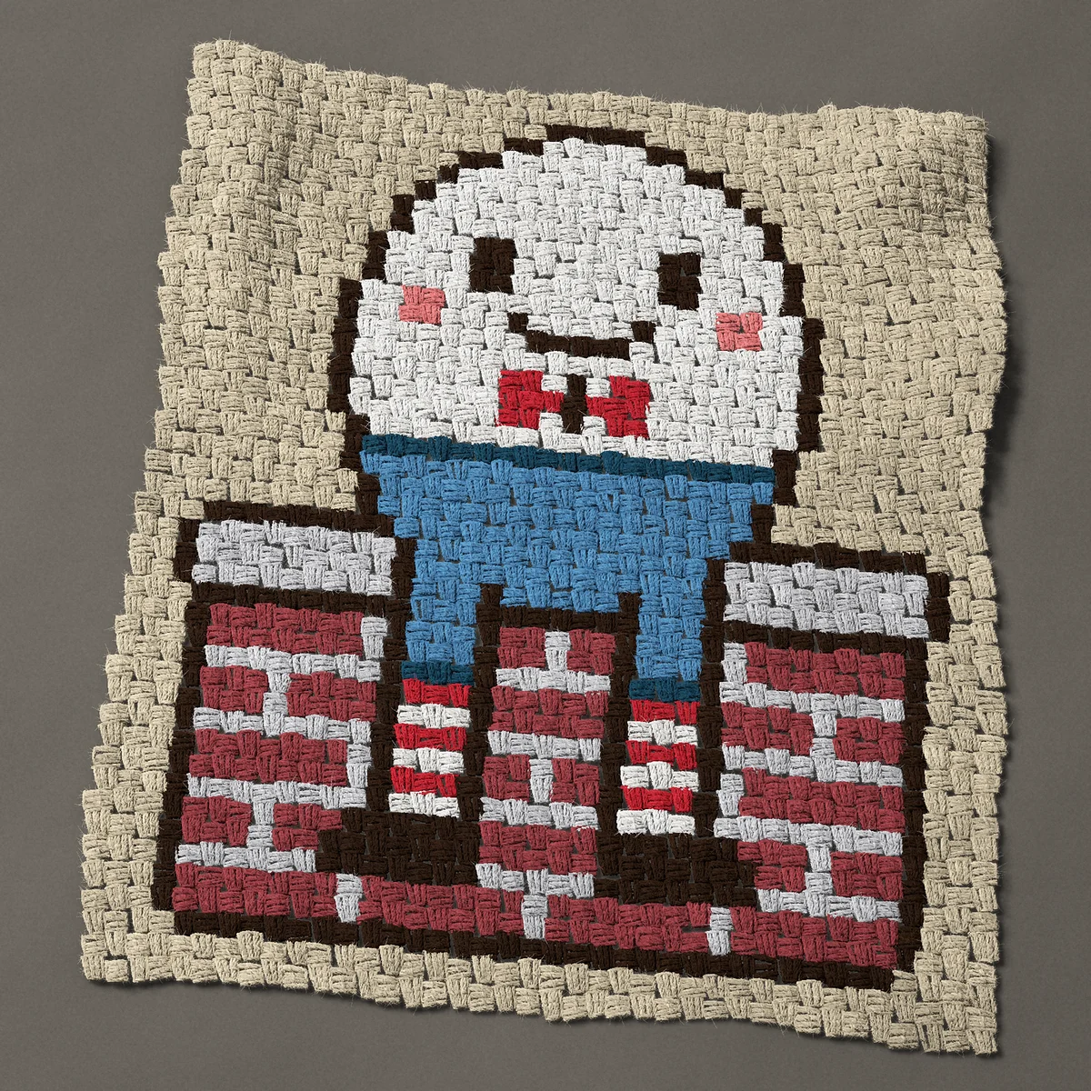 A panel worked corner to corner, 29¼ by 34½ inches: Humpty Dumpty sitting on a brick wall, nursery rhyme, 39 by 46 blocks