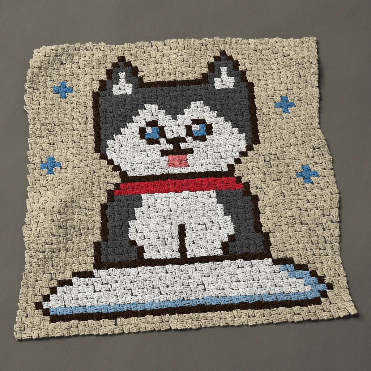 A panel worked corner to corner, 33¾ by 34½ inches: Husky puppy with blue eyes sitting in the snow, 45 by 46 blocks