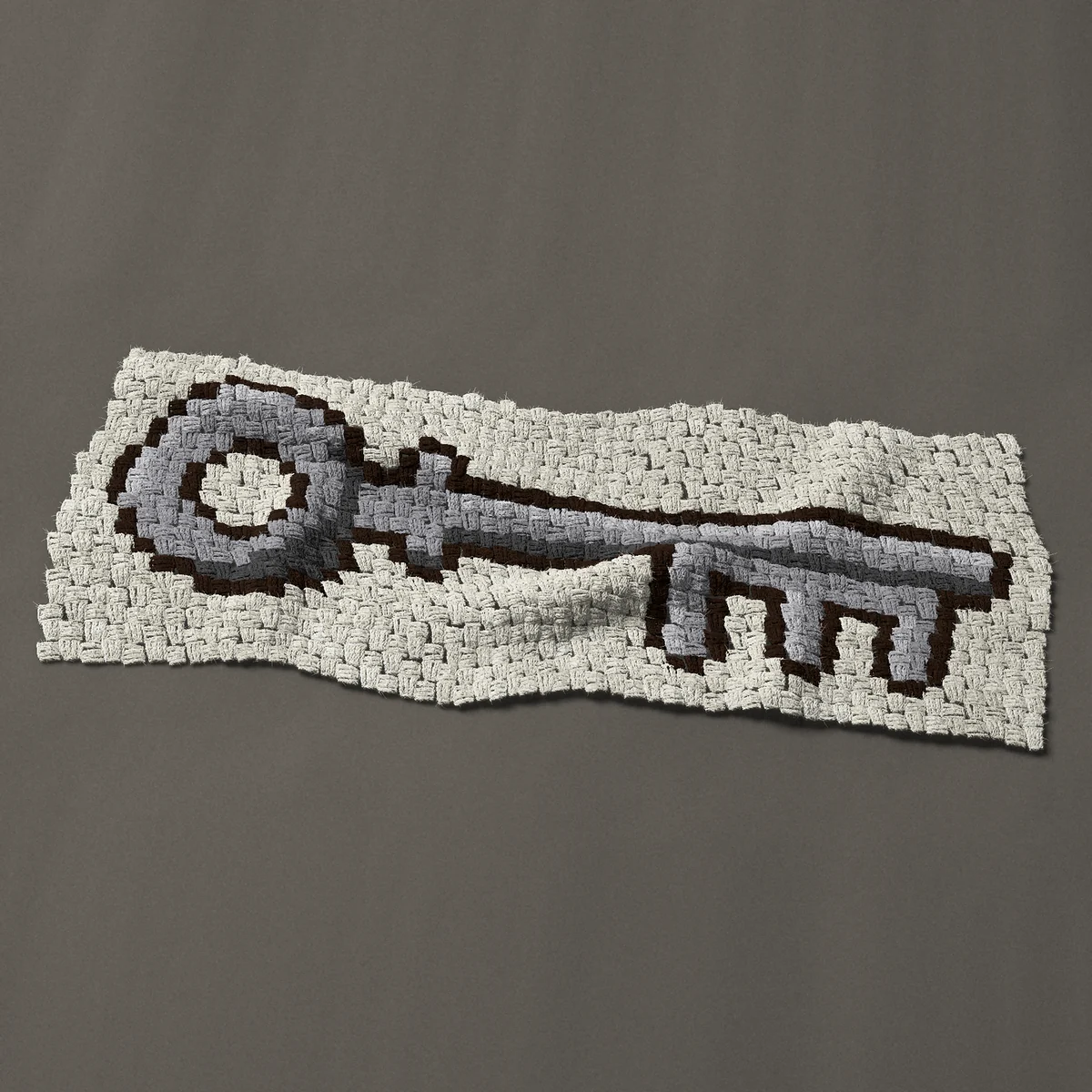 A panel worked corner to corner, 40½ by 15¾ inches: Vintage iron skeleton key with three long teeth, 54 by 21 blocks