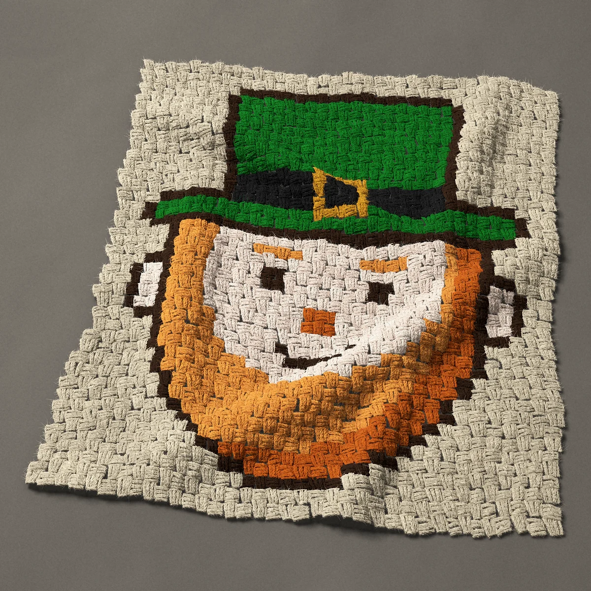 A panel worked corner to corner, 27¾ by 32¼ inches: St Patrick's Day leprechaun face with an orange beard, 37 by 43 blocks