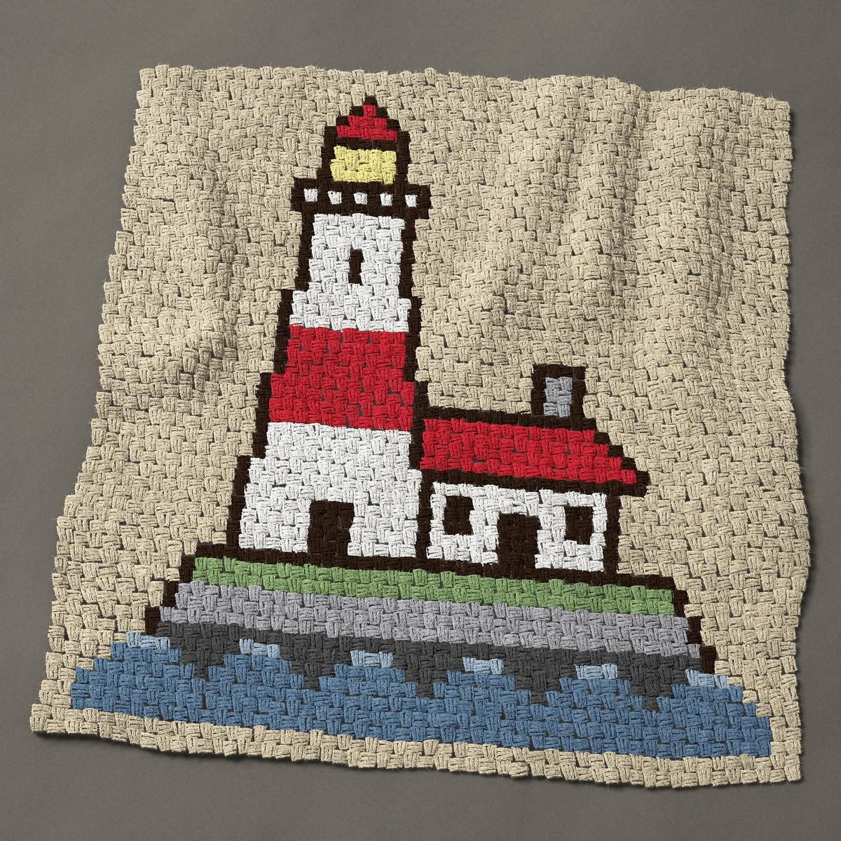 A baby blanket worked corner to corner, 39½ by 42 inches: Lighthouse and keeper's cottage on a rocky island, 53 by 56 blocks