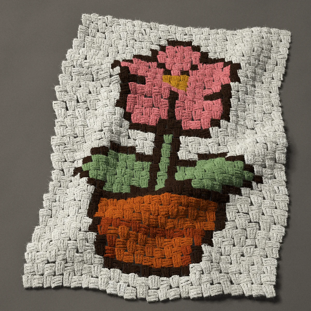 A panel worked corner to corner, 18¾ by 27 inches: Little pink flower in a terracotta flower pot, 25 by 36 blocks
