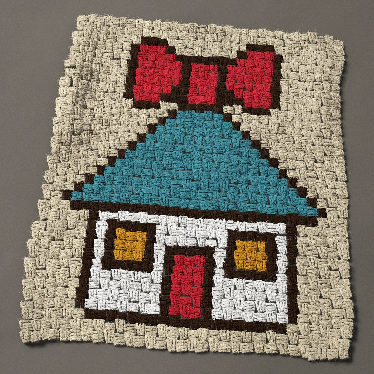 A panel worked corner to corner, 23¼ by 27 inches: New home gift: little white house with a big red bow, 31 by 36 blocks