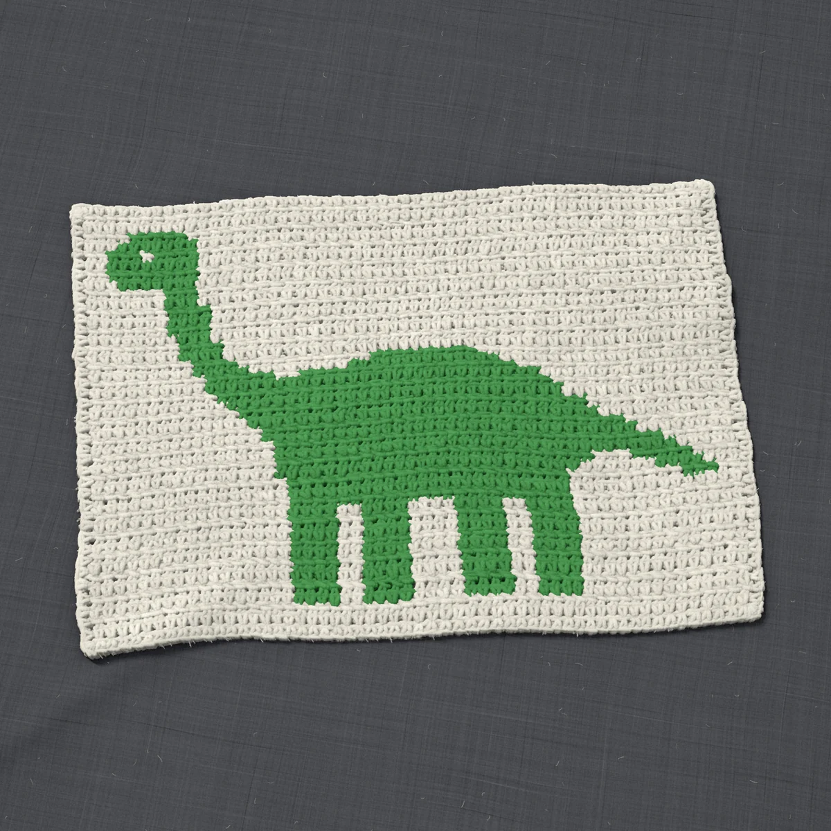A panel in single crochet, 16.9 by 11.7 inches: a long-necked dinosaur in green on a cream ground, 55 stitches by 44 rows