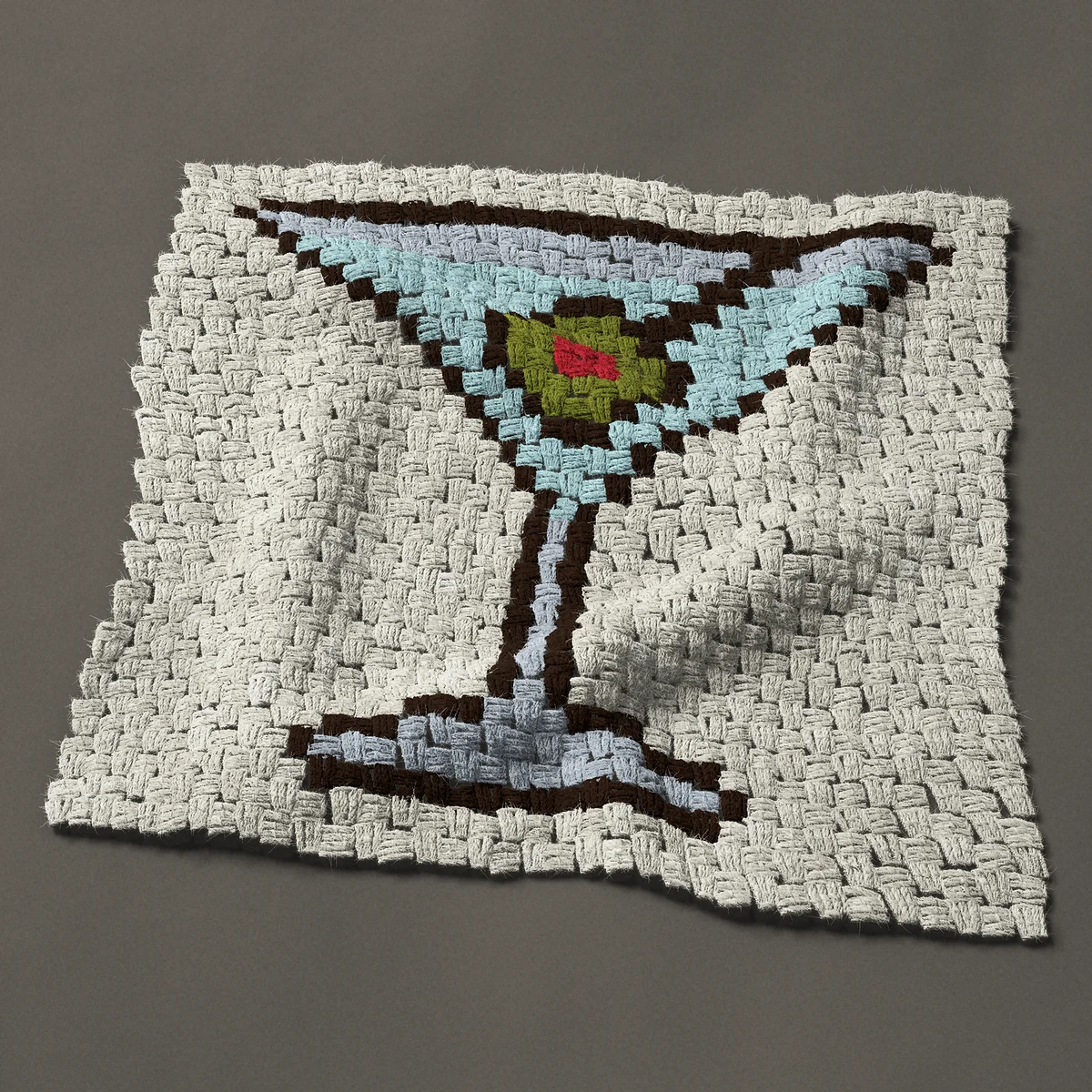 A panel worked corner to corner, 26¼ by 25½ inches: Martini cocktail glass with a green olive on a stick, 35 by 34 blocks