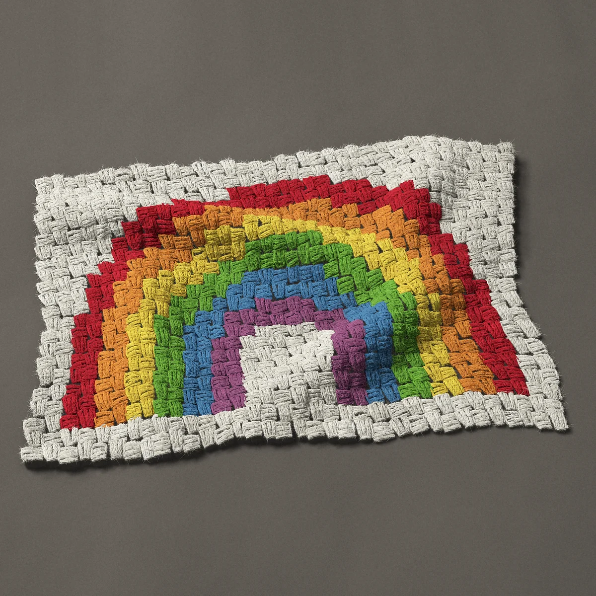 A panel worked corner to corner, 25½ by 17¼ inches: Rainbow in six colors, 34 by 23 blocks