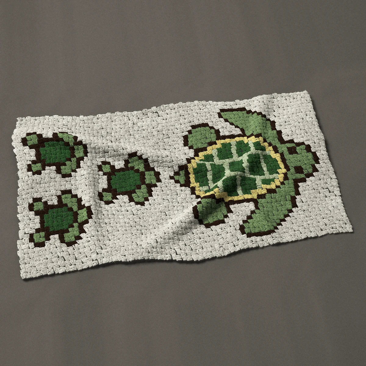 A baby blanket worked corner to corner, 50 by 29¼ inches: Sea turtle mom and three babies swimming behind her, 67 by 39 blocks