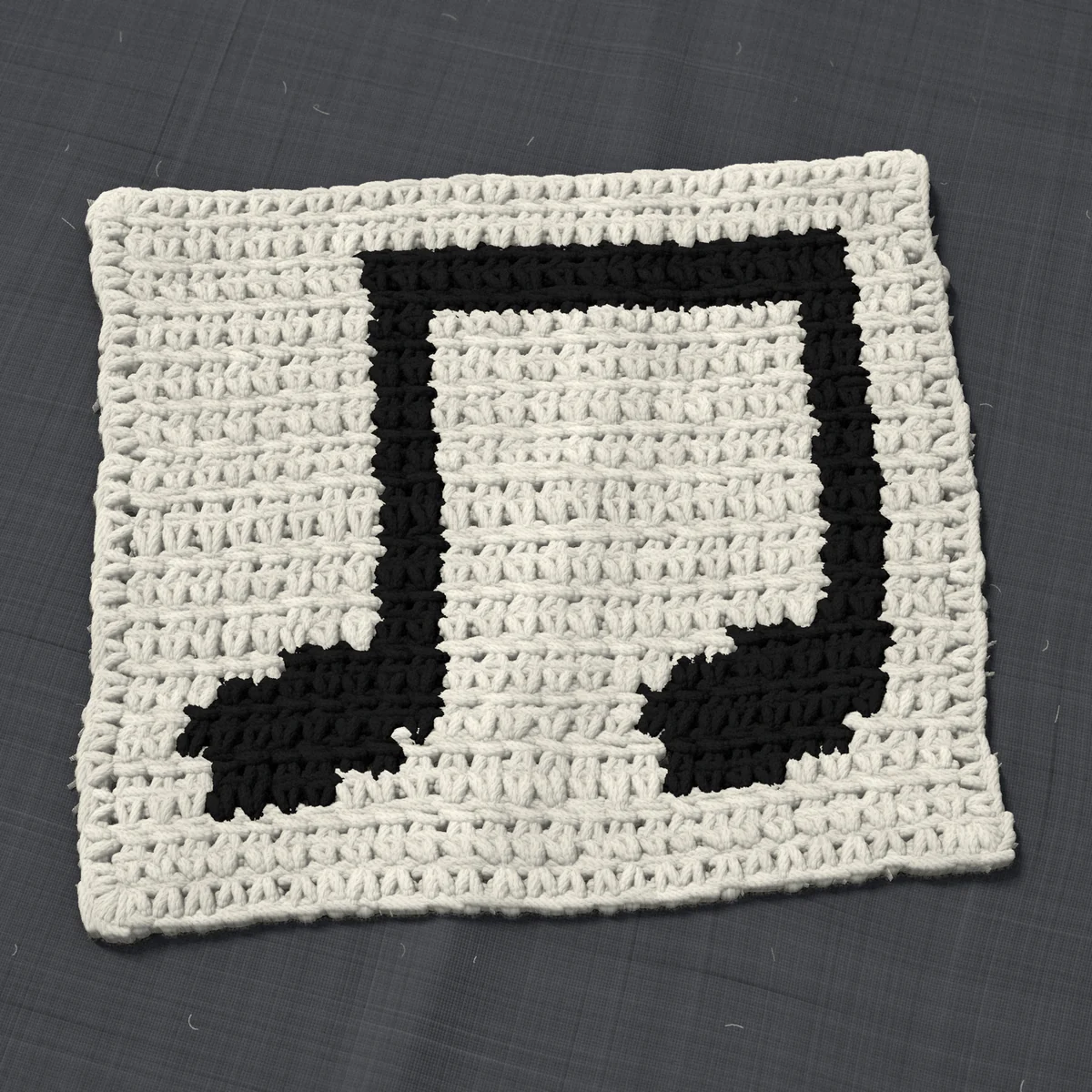 A dishcloth in single crochet, 8 by 6.9 inches: a pair of beamed eighth notes in black on a cream ground, 26 stitches by 26 rows