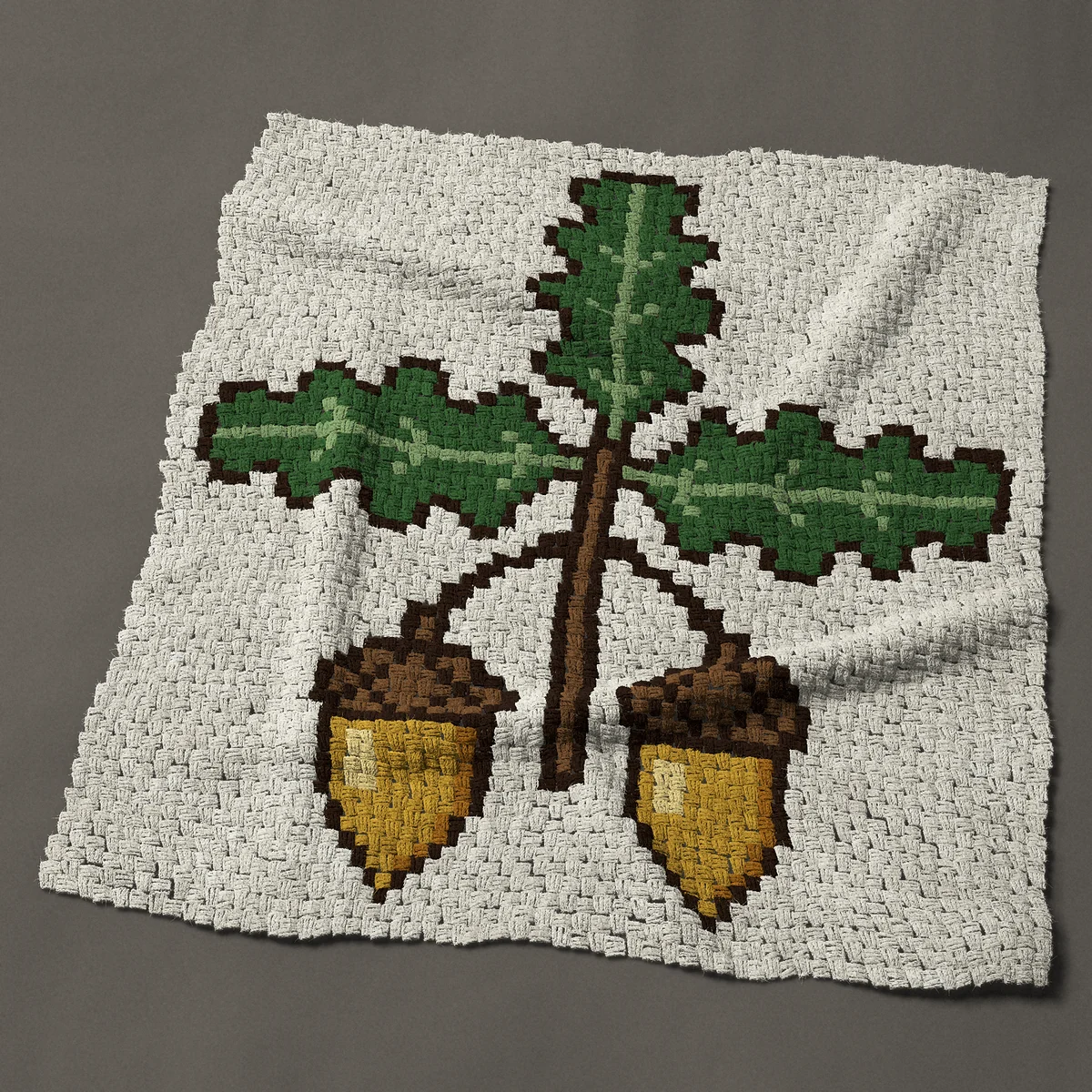 A panel worked corner to corner, 45½ by 51 inches: Oak sprig with two acorns and three oak leaves, 61 by 68 blocks